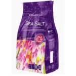 Purple bag of Aquarium Sea Salt for marine fish, with colorful fish illustration on front and check-your-salt badge visible