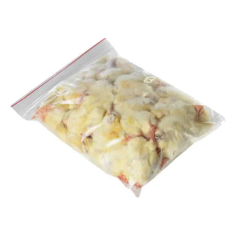 Bag of frozen hash browns in a clear resealable plastic bag, ready for cooking.