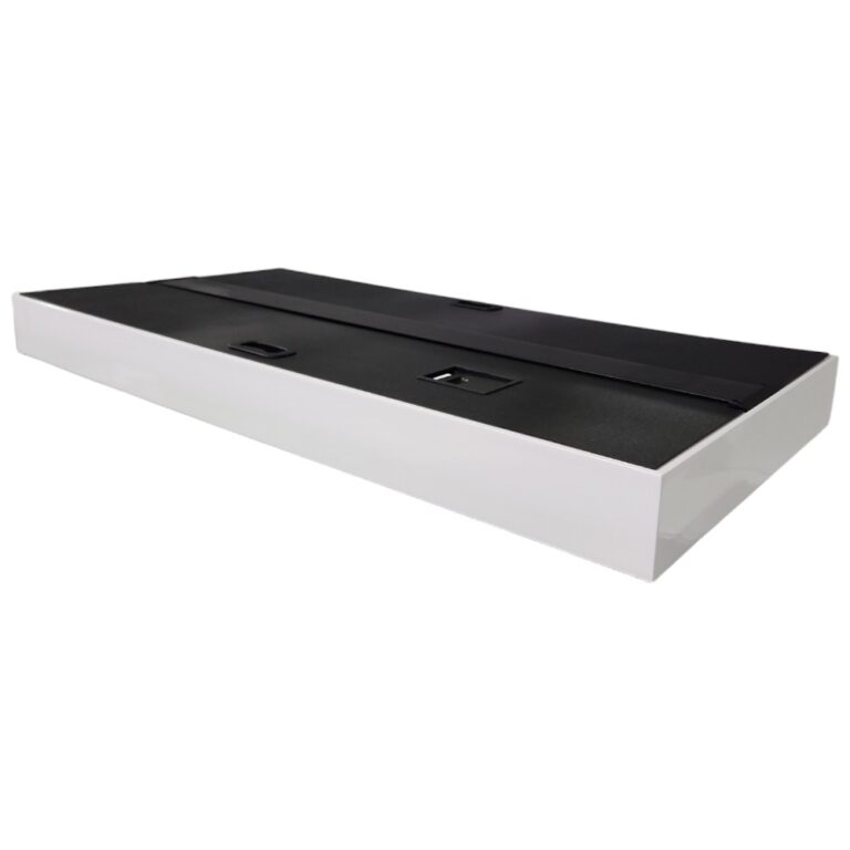 Long white rectangular device with a black top panel and two small recessed latches, shown at an angle on a white background.