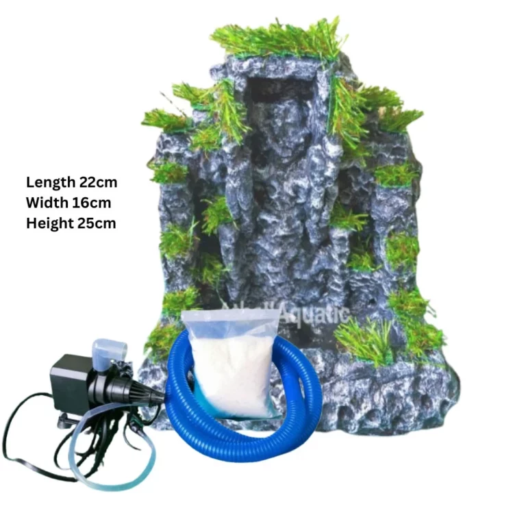 Aquarium rock waterfall decoration with attached pump and blue tubing; includes bag of filter media.