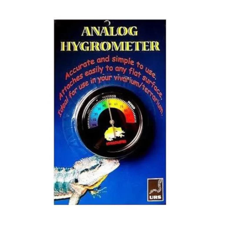 Boxed product labeled 'Analog Hygrometer' with a circular colored gauge and a crocodile graphic on a blue background, for monitoring humidity in vivariums/vivariums.