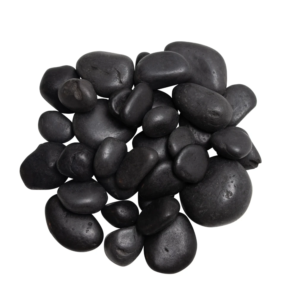 fish Pile of smooth black pebbles arranged together on a white background